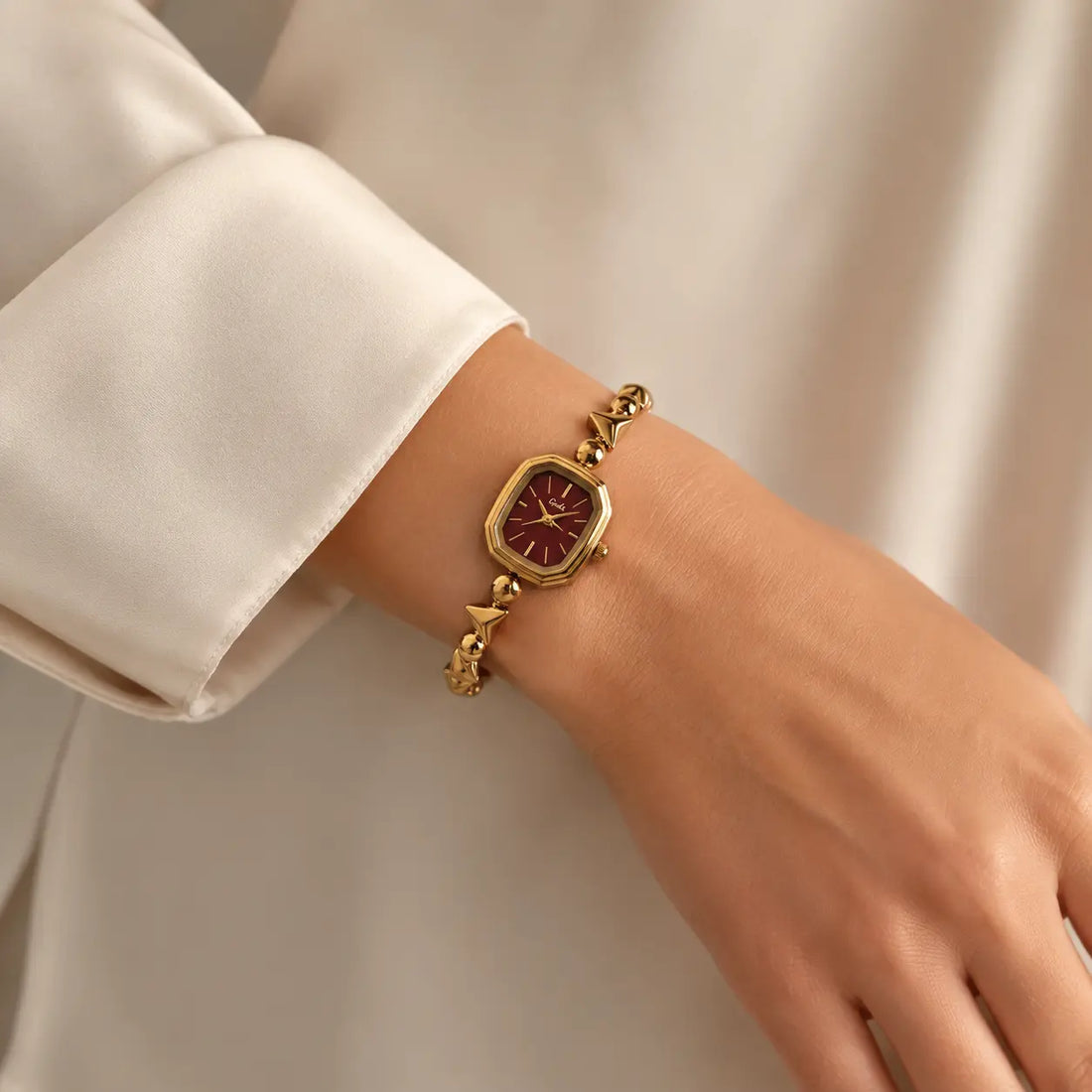 MAVI Colette gold bracelet watch with burgundy dial